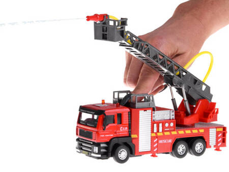 Fire brigade fire truck with ladder spraying water ZA4641
