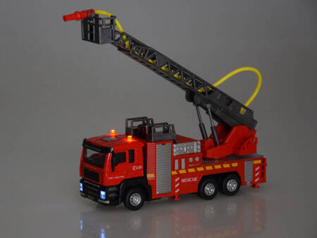 Fire brigade fire truck with ladder spraying water ZA4641